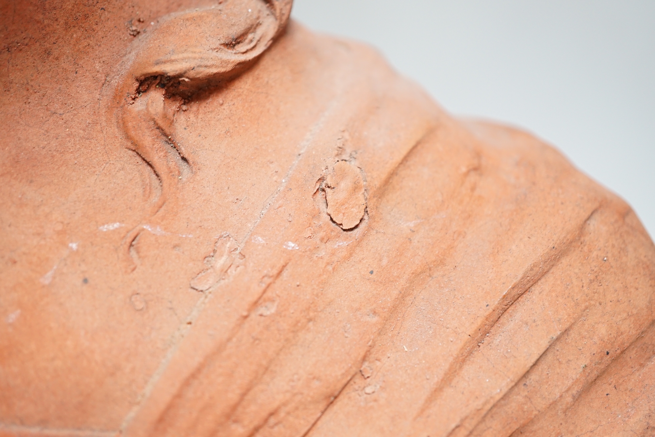 An Art Nouveau-style terracotta portrait bust of a young girl, 46cm high